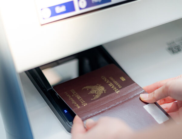 Securely Emailing Your Passport Scan: female-hand-holding-personal-passport-scanning