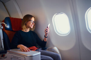 Comfortable Airplane Seats: A Lady on a business class seat