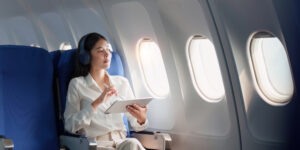 Comfortable Airplane Seats: A lady in an airplane economy seat